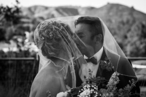 Bride and groom kissing in Agoura Hills.