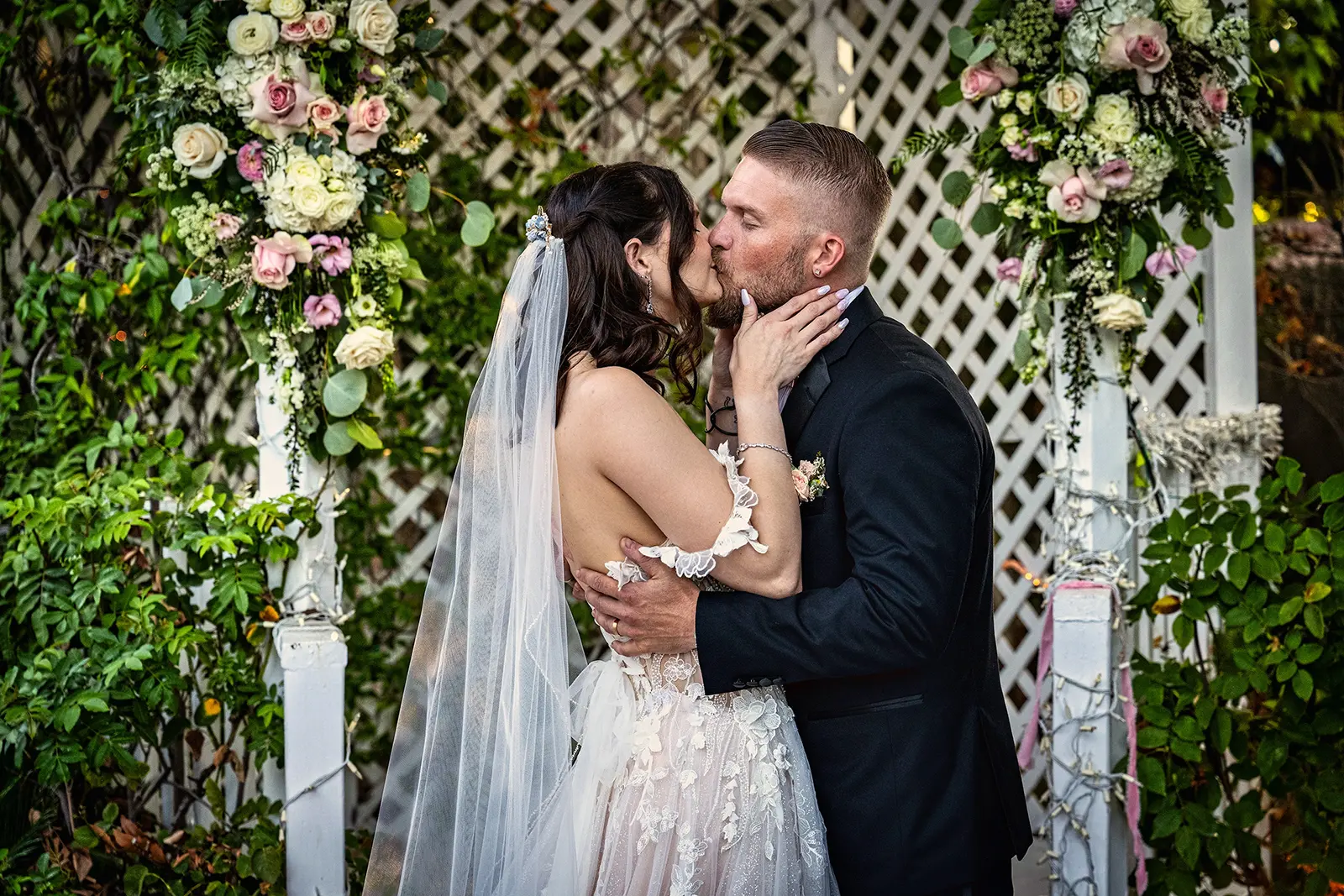 los-angeles-wedding-photographer Bride and groom kissing during Los Angeles wedding ceremony.
